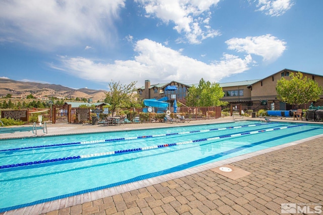 8956 Suncreek Trl, Reno, NV 89523 - community pool featuring a mountain view