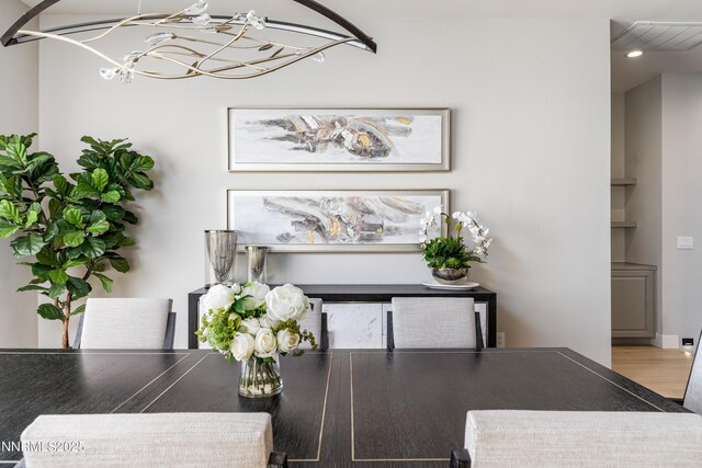 8956 Suncreek Trl, Reno, NV 89523 - dining room with a chandelier, recessed lighting, and wood finished floors