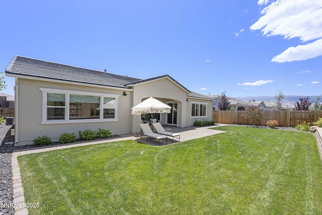 2313 Blushing Rock Dr, Reno, NV 89521 - back of house with a patio area and stucco siding