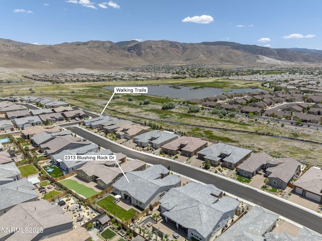 2313 Blushing Rock Dr, Reno, NV 89521 - aerial overview of property's location with a water and mountain view and nearby suburban area