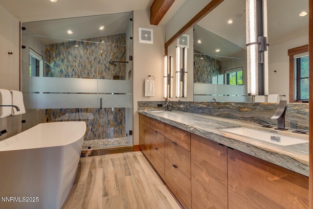 4250 N Lake Blvd, Carnelian Bay, CA 96140 - bathroom with a shower stall, a soaking tub, double vanity, recessed lighting, and wood finished floors