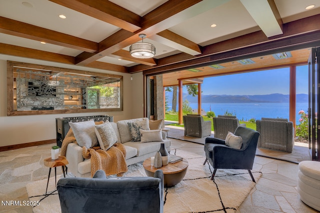 4250 N Lake Blvd, Carnelian Bay, CA 96140 - living area with beam ceiling, a water and mountain view, healthy amount of natural light, stone tile flooring, and coffered ceiling