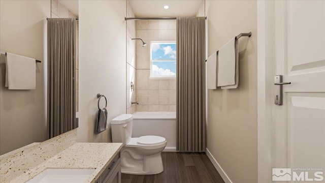 1223 Golden Eagle Ct, Gardnerville, NV 89410 - bathroom with wood finished floors, vanity, toilet, shower / bath combination, and baseboards