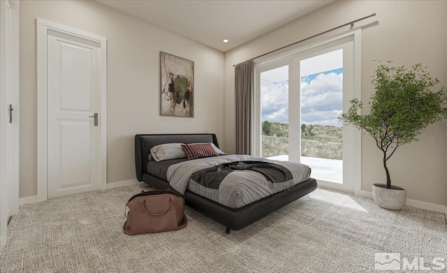 1223 Golden Eagle Ct, Gardnerville, NV 89410 - bedroom with access to outside, carpet flooring, multiple windows, and baseboards