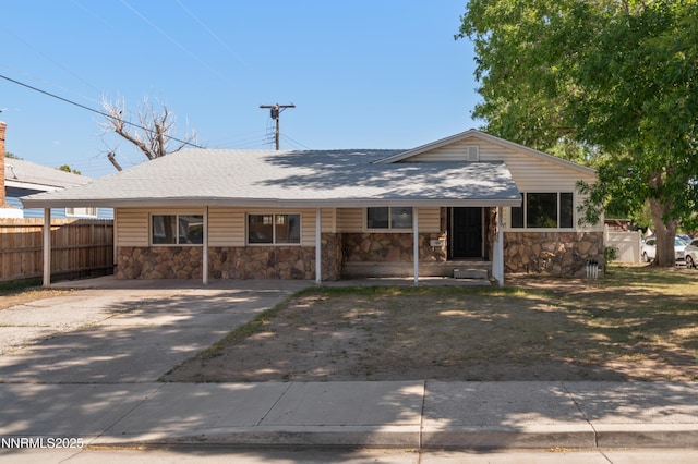 1600 Duke Way, Reno, NV 89502 - single story home featuring stone siding, covered porch, and a shingled roof