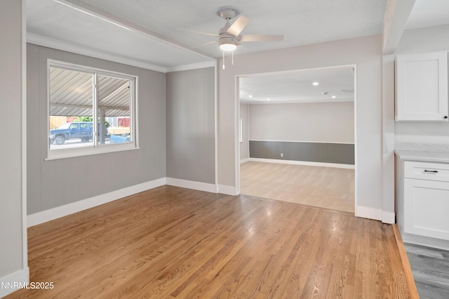 1600 Duke Way, Reno, NV 89502 - empty room featuring a ceiling fan, light wood finished floors, baseboards, ornamental molding, and recessed lighting