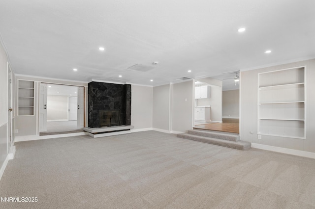 1600 Duke Way, Reno, NV 89502 - unfurnished living room with built in shelves, light colored carpet, baseboards, recessed lighting, and crown molding