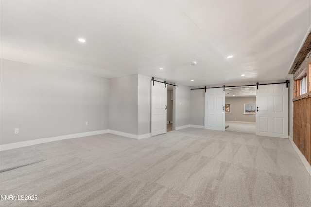1600 Duke Way, Reno, NV 89502 - basement with a barn door, light carpet, recessed lighting, and baseboards