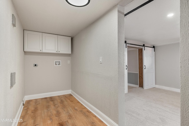1600 Duke Way, Reno, NV 89502 - laundry area featuring cabinet space, hookup for a washing machine, hookup for an electric dryer, baseboards, and a barn door