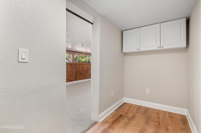1600 Duke Way, Reno, NV 89502 - laundry area featuring baseboards and light wood finished floors