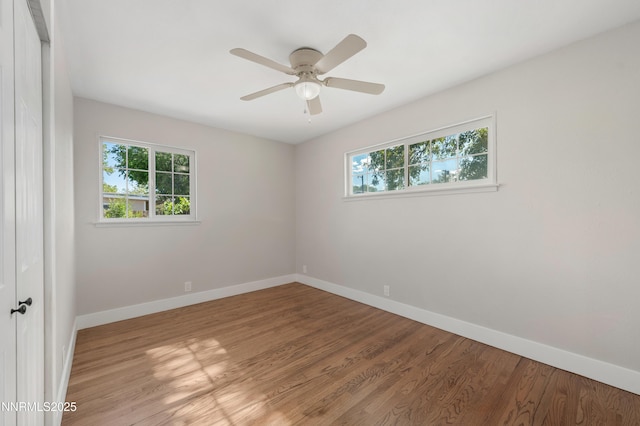 1600 Duke Way, Reno, NV 89502 - unfurnished room with plenty of natural light, baseboards, and wood finished floors