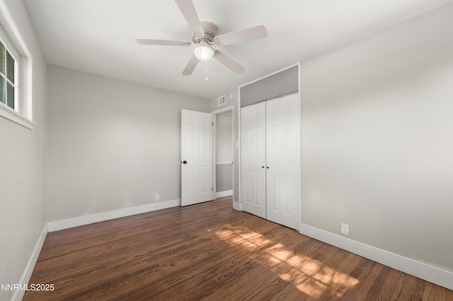 1600 Duke Way, Reno, NV 89502 - unfurnished bedroom with baseboards, wood finished floors, a closet, and ceiling fan