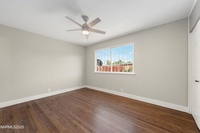 1600 Duke Way, Reno, NV 89502 - spare room with dark wood-style flooring, ceiling fan, and baseboards