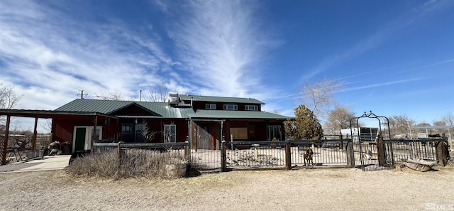 3860 Edwards Ln, Fallon, NV 89406 - view of front of house featuring a fenced front yard and a metal roof