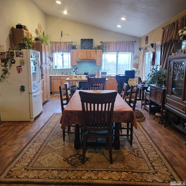 3860 Edwards Ln, Fallon, NV 89406 - dining room with vaulted ceiling, hardwood / wood-style flooring, and recessed lighting