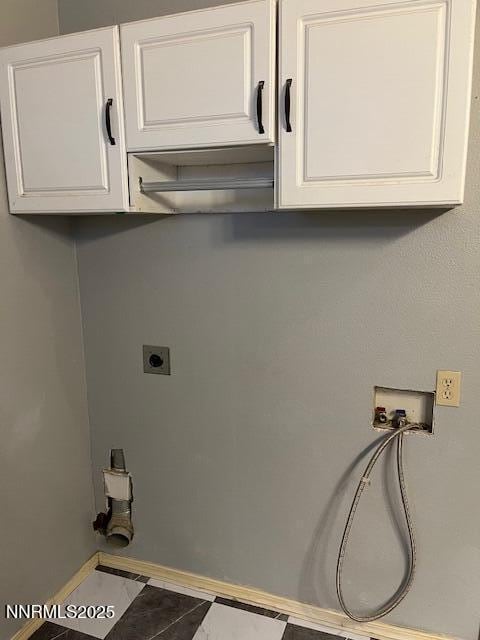 3860 Edwards Ln, Fallon, NV 89406 - washroom with cabinet space, hookup for a washing machine, tile patterned flooring, and hookup for an electric dryer
