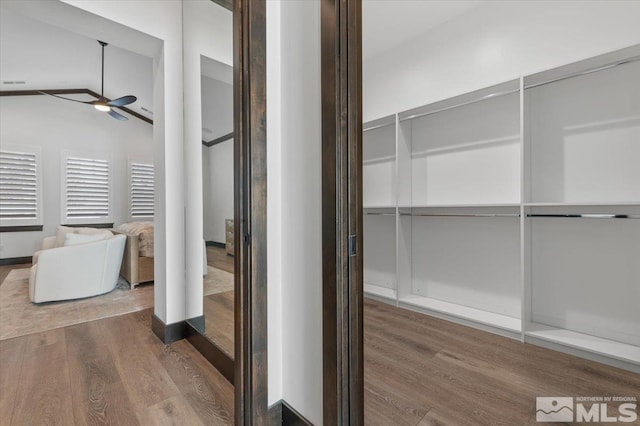 20765 Parc Foret Dr, Reno, NV 89511 - bathroom with wood finished floors, ceiling fan, and baseboards