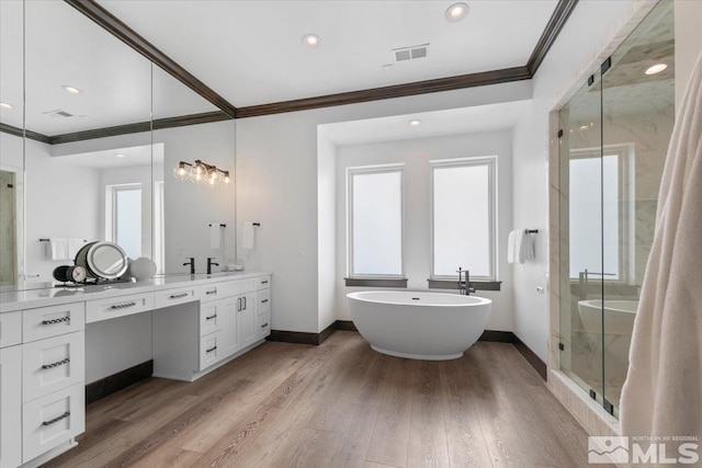 20765 Parc Foret Dr, Reno, NV 89511 - full bath with ornamental molding, a shower stall, vanity, baseboards, and wood finished floors