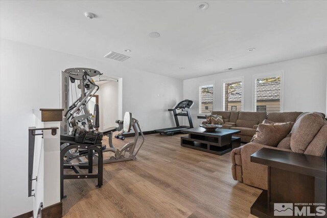 20765 Parc Foret Dr, Reno, NV 89511 - exercise room featuring wood finished floors, recessed lighting, and baseboards