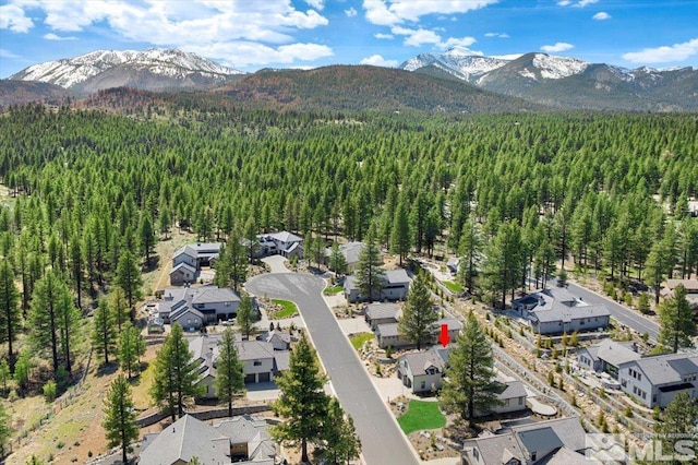 20765 Parc Foret Dr, Reno, NV 89511 - aerial perspective of suburban area with a forest and mountains