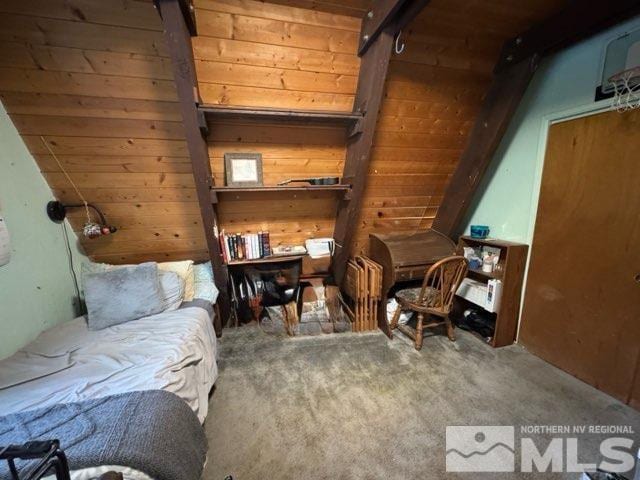 1589 Cree St, South Lake Tahoe, CA 96150 - living area with carpet flooring, wood walls, and lofted ceiling