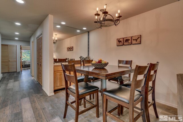 931 Incline Way Unit 249Mccloud, Incline Village, NV 89451 - dining room featuring dark wood-type flooring, baseboards, a chandelier, and recessed lighting