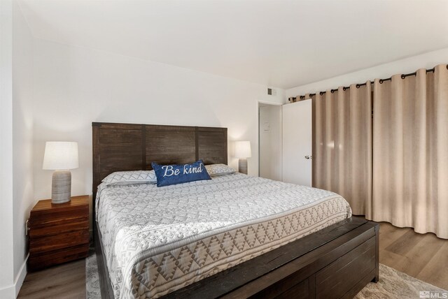 2445 Sycamore Glen Dr Unit 6, Sparks, NV 89434 - bedroom with wood finished floors