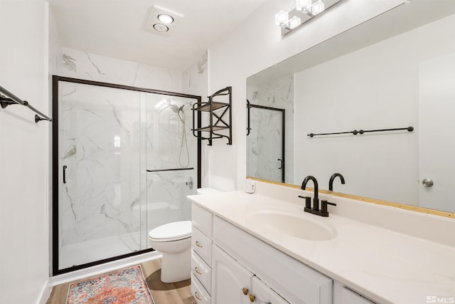 2445 Sycamore Glen Dr Unit 6, Sparks, NV 89434 - full bath featuring a marble finish shower, toilet, wood finished floors, and vanity