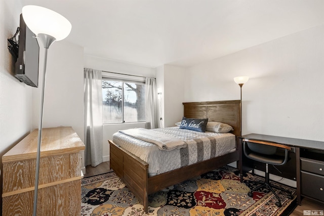 2445 Sycamore Glen Dr Unit 6, Sparks, NV 89434 - bedroom with wood finished floors and a desk