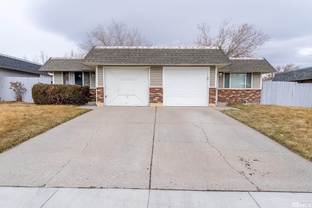 1640 Gault Way, Sparks, NV 89431 - ranch-style house with a garage, brick siding, driveway, and a shingled roof