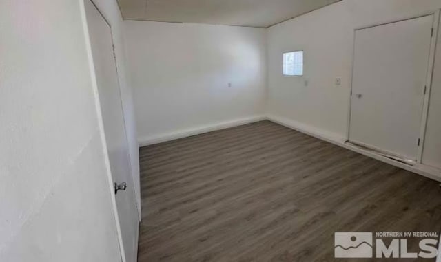 309 M St, Hawthorne, NV 89415 - unfurnished room with wood finished floors and baseboards