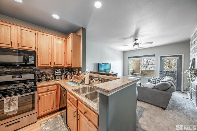 900 S Meadows Pkwy Unit 3522, Reno, NV 89521 - kitchen featuring black appliances, open floor plan, a sink, a ceiling fan, and light brown cabinetry