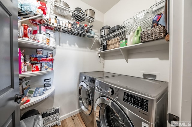 900 S Meadows Pkwy Unit 3522, Reno, NV 89521 - laundry room with washing machine and clothes dryer, wood finished floors, and baseboards