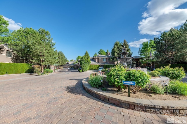 900 S Meadows Pkwy Unit 3522, Reno, NV 89521 - view of decorative road with a gated entry and curbs