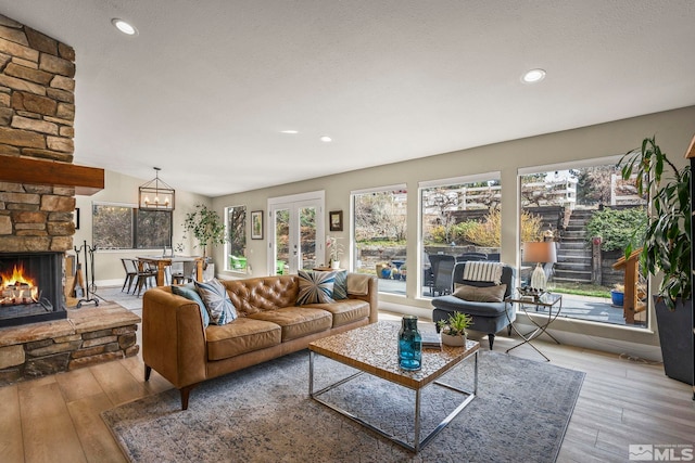 4400 Bridle Way, Reno, NV 89519 - living area featuring a fireplace, healthy amount of natural light, wood finished floors, and recessed lighting