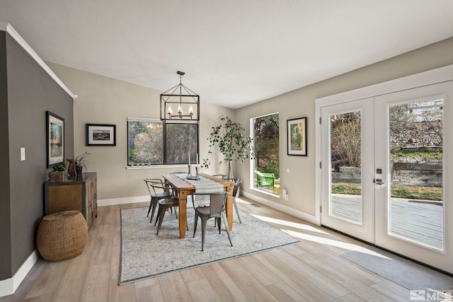 4400 Bridle Way, Reno, NV 89519 - dining area with plenty of natural light, baseboards, and french doors