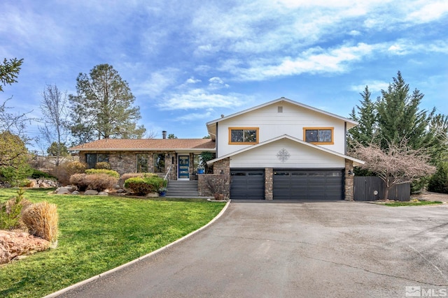 4400 Bridle Way, Reno, NV 89519 - split level home featuring driveway, a garage, and brick siding