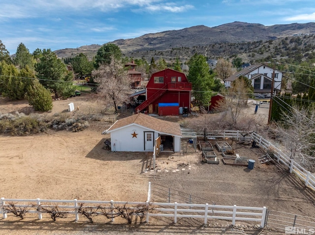 4400 Bridle Way, Reno, NV 89519 - view of yard with an outdoor structure, a mountain view, and fence
