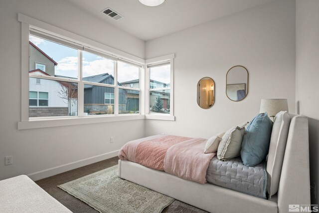605 Braided Rope Dr, Reno, NV 89511 - carpeted bedroom featuring baseboards