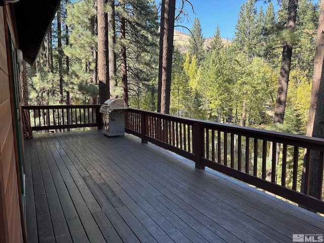 100 Timber Ln, Markleeville, CA 96120 - wooden deck featuring area for grilling and a wooded view