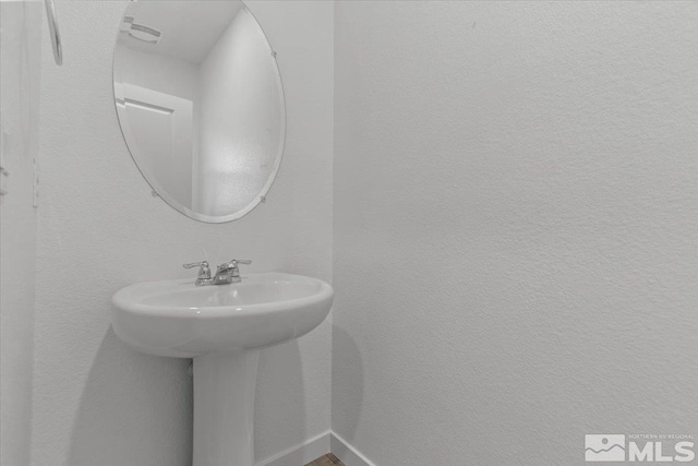 8863 Gazing Star Dr, Reno, NV 89506 - bathroom featuring baseboards