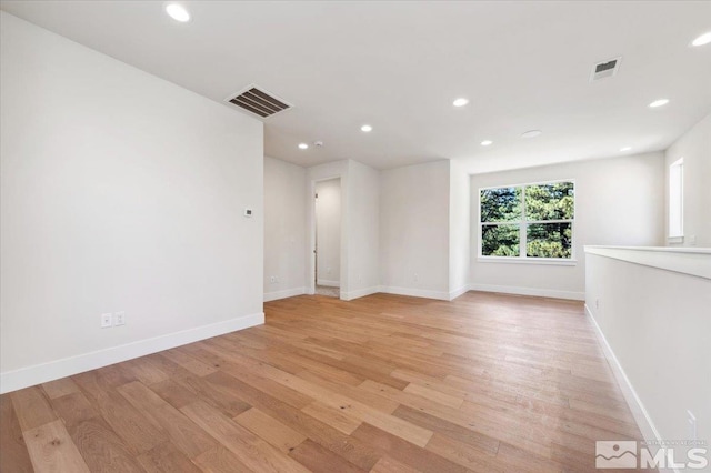 5192 Bordeaux Dr, Reno, NV 89511 - unfurnished room featuring light wood finished floors, recessed lighting, and baseboards