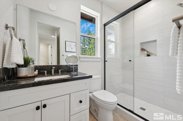 5192 Bordeaux Dr, Reno, NV 89511 - full bathroom with a shower stall, toilet, and vanity
