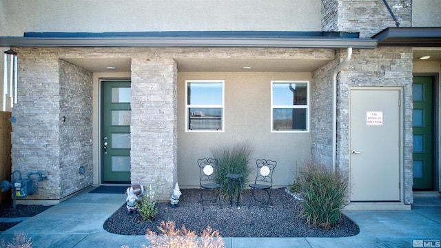 3617 Pulsar Ln Unit 2, Carson City, NV 89705 - view of exterior entry featuring stone siding and stucco siding