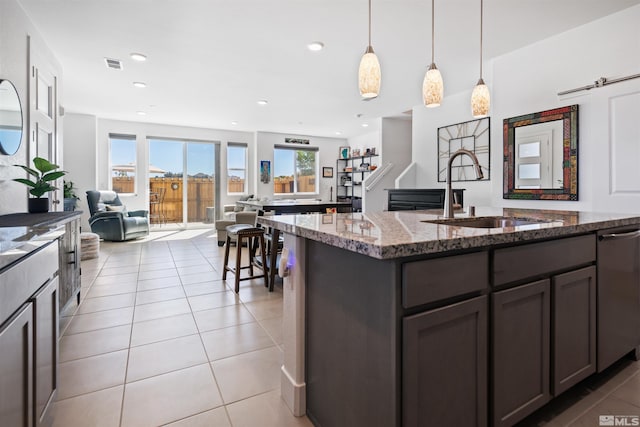 3617 Pulsar Ln Unit 2, Carson City, NV 89705 - kitchen featuring a sink, light tile patterned floors, dishwasher, stone countertops, and recessed lighting