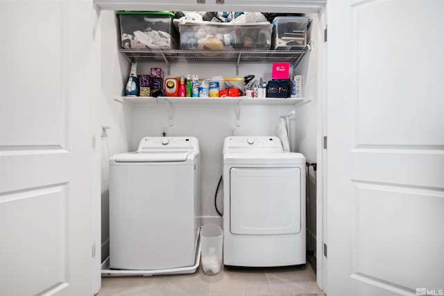 3617 Pulsar Ln Unit 2, Carson City, NV 89705 - laundry room with washer and clothes dryer and light tile patterned floors