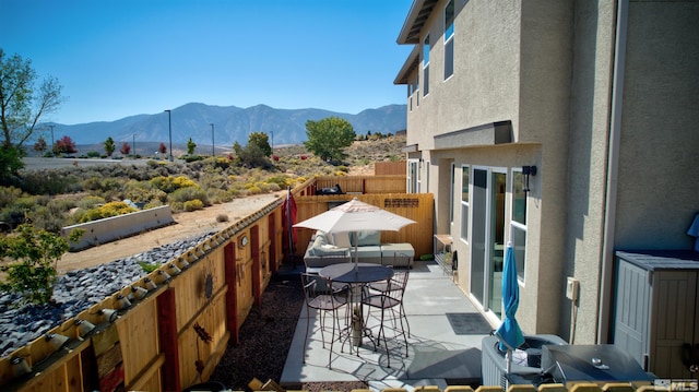 3617 Pulsar Ln Unit 2, Carson City, NV 89705 - balcony with a mountain view and a patio