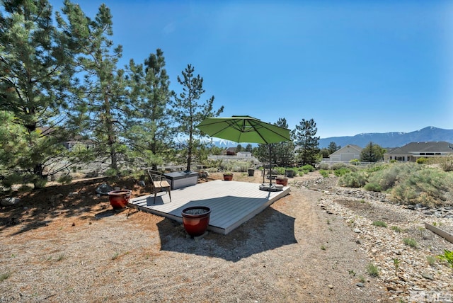 1655 Chiquita Cir, Minden, NV 89423 - view of yard featuring a deck with mountain view