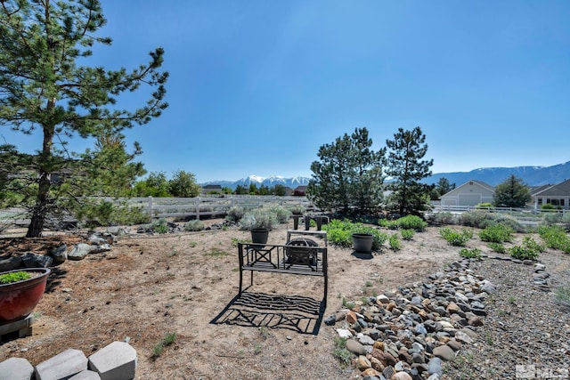 1655 Chiquita Cir, Minden, NV 89423 - view of yard with a mountain view and a fire pit