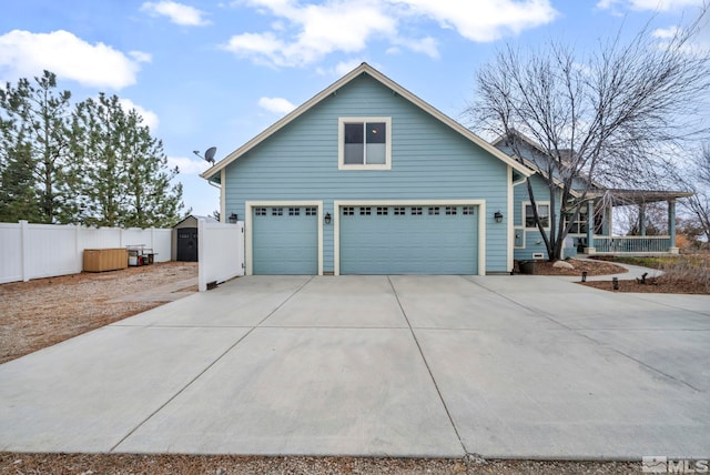 1655 Chiquita Cir, Minden, NV 89423 - view of front of home with concrete driveway and a garage
